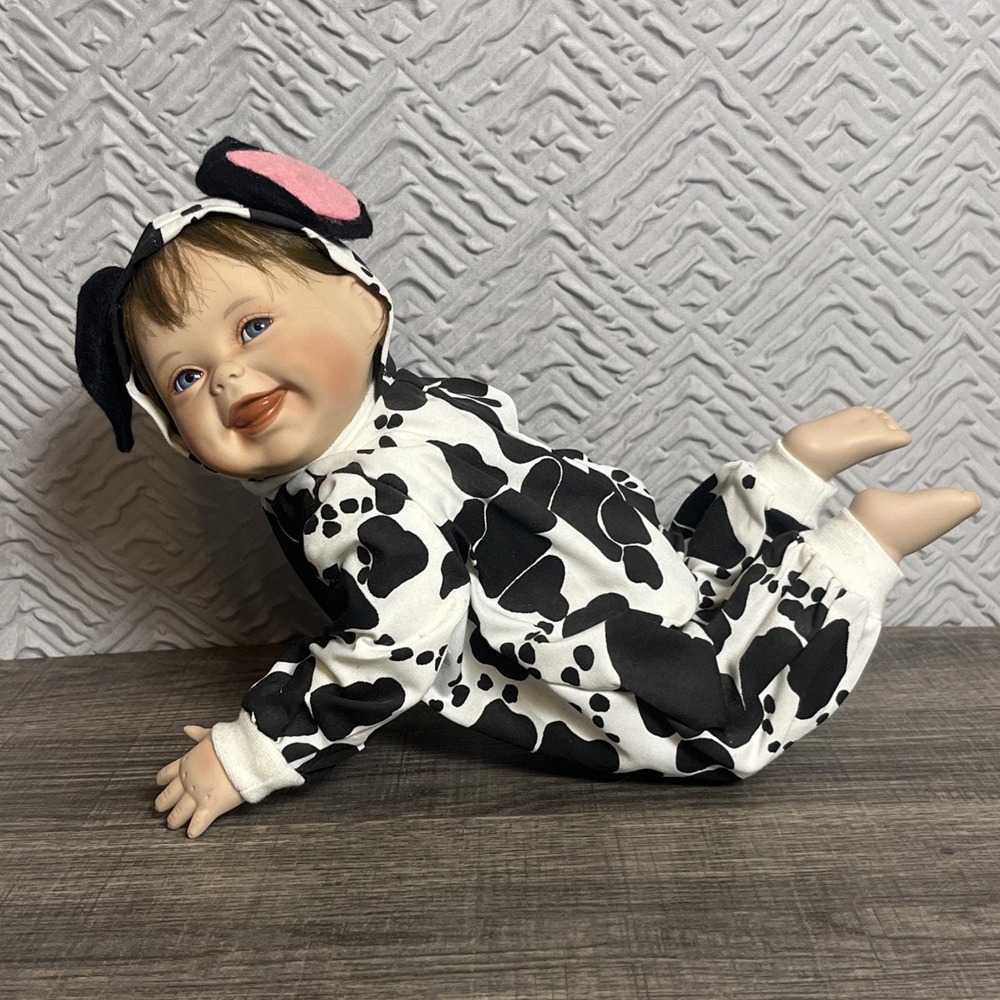 The Ashton-Drake Galleries The Cow Jumped Over the Moon Porcelain Cow Baby Doll